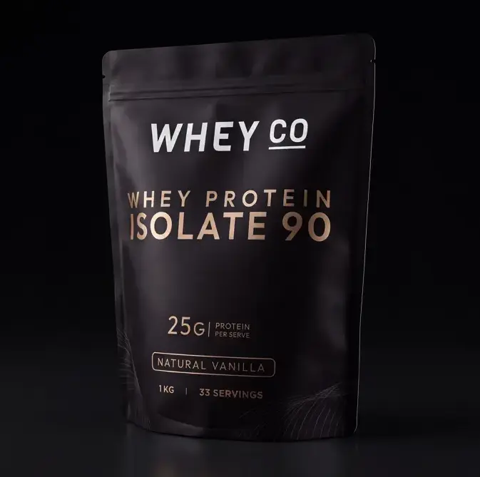 The Whey Co matte black shaker and WPI 90 protein pouch side by side