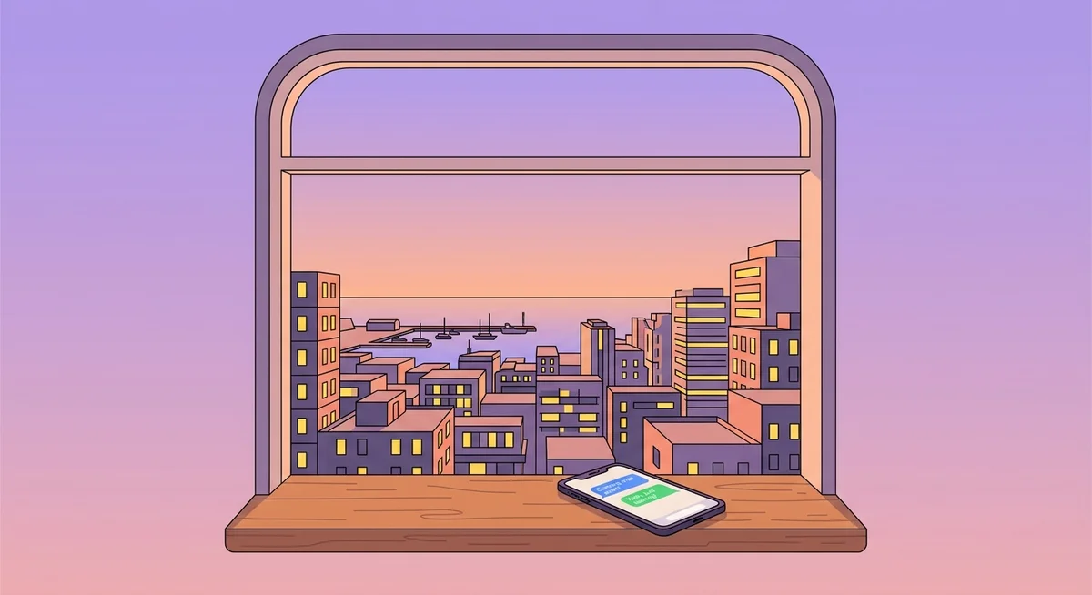 View from an apartment window over a fictional city at dusk with a phone showing a chat